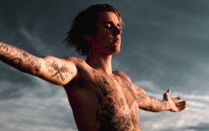 Justin Bieber Flaunts His '100 Hours of Work' Tattoo 