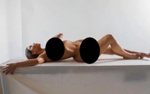 Here's Why Kim Kardashian Posts Explicit Nude Pics to Promote New Fragrance
