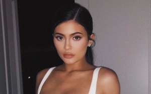 Kylie Jenner Flaunts Underboob in Latex Bra for New Kylie Cosmetics Launch