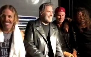 John Travolta Joins Foo Fighters Onstage at New York Gig