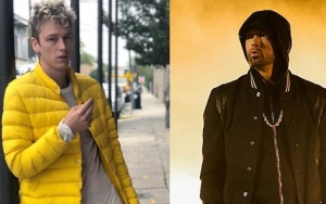  Machine Gun Kelly Says His Rap Feud With Eminem Is About Past Grievance