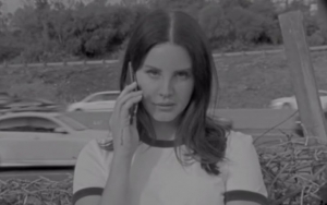 Lana Del Rey Wandering Around California Streets in 'Mariners Apartment Complex' Video