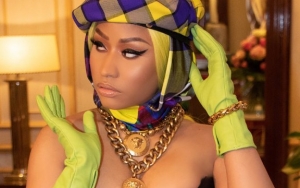Nicki Minaj's Boobs Almost Burst Out in Revealing Tight Bustier at Milan Fashion Week