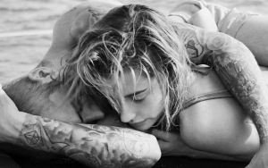 Justin Bieber and Hailey Baldwin Cozying Up to Each Other in Kissing Snaps