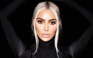 Kim Kardashian Shares Pic of Herself Getting 'Painful' Laser to Tighten Her Stomach