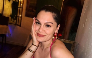 Jessie J Reveals Baby's Gender, Bares Baby Bump in Fire Engine Red Dress at BRITs 2023
