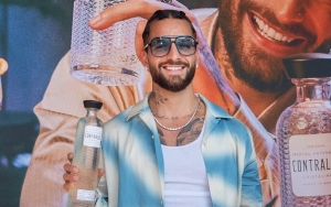 Maluma Almost Exposes Himself in New Steamy Nude Pool Photos