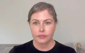 Nicole Eggert Proudly Debuts Shaved Head in New Video Amid Battle With Breast Cancer