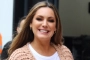 Kelly Brook Auctions Off Her Designer Clothes in 'Cathartic' Clear-Out