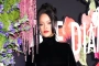 Rihanna Fuels Pregnancy Rumor After Being Caught on Camera Fake-Sipping Champagne 