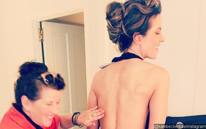 Picture: Kate Beckinsale Cheekily Flashes Butt in Daring Backless Ensemble