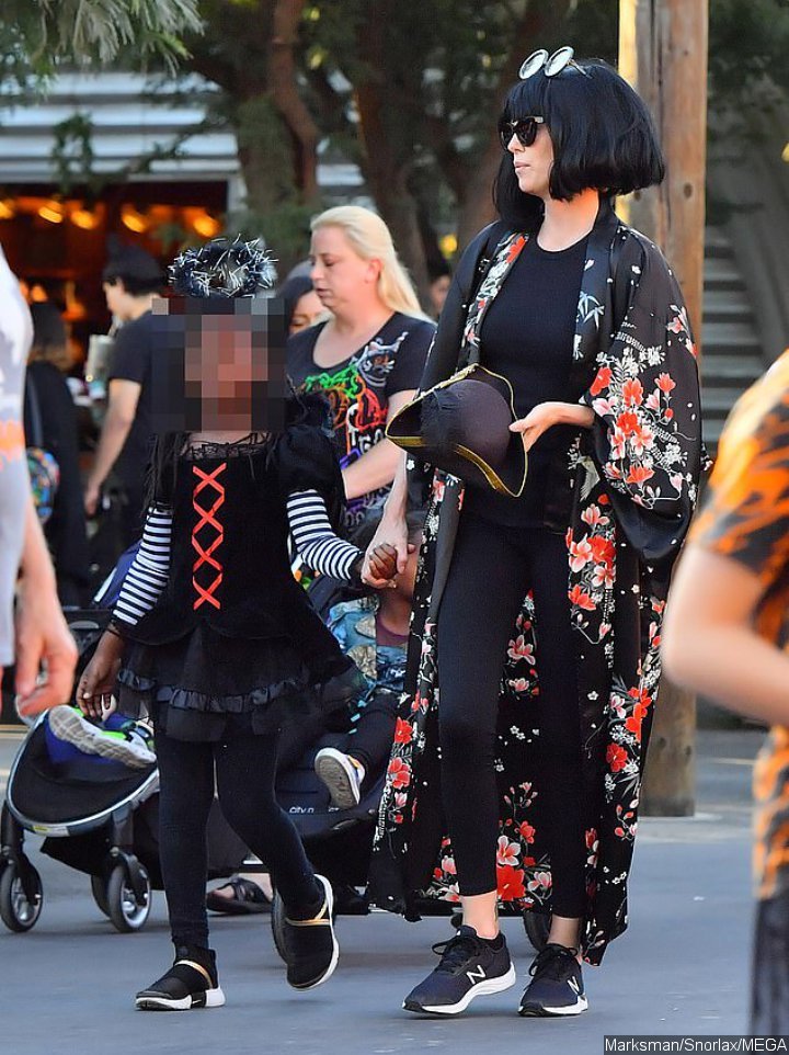 Charlize Theron Dresses Up as Edna at Disneyland