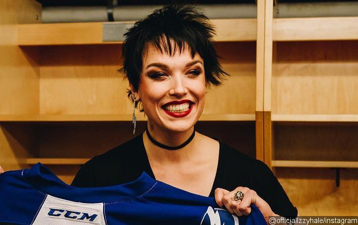 Halestorm Frontwoman Trusts Brother 'Very Secure' to Help Her With Threesome Song