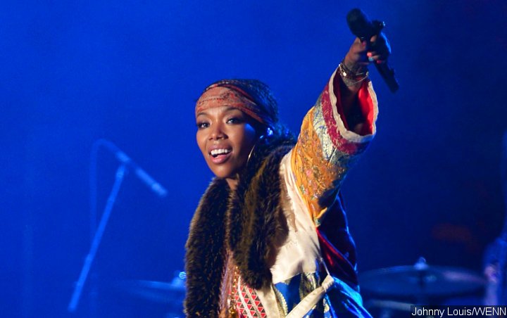 Video: Brandy Takes a Tumble During Performance in Florida
