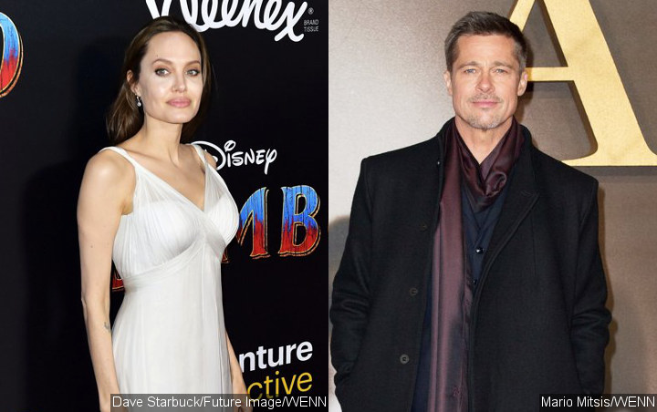 Report: Angelina Jolie Dragging Out Divorce With Brad Pitt in Hopes of Reconciliation