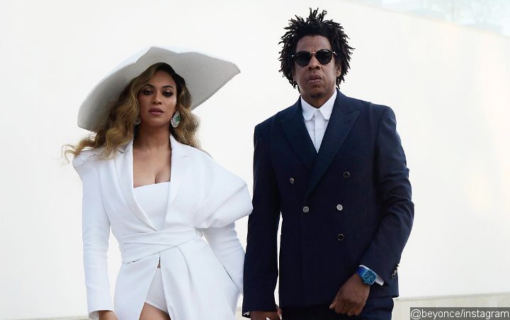 Video: Beyonce Looks Annoyed as Jay-Z Talks to Raven Beauty at NBA Finals Game