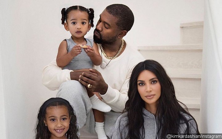 Kim Kardashian Accused of Photoshopping Children in Family Christmas Card: They Look Like Stickers