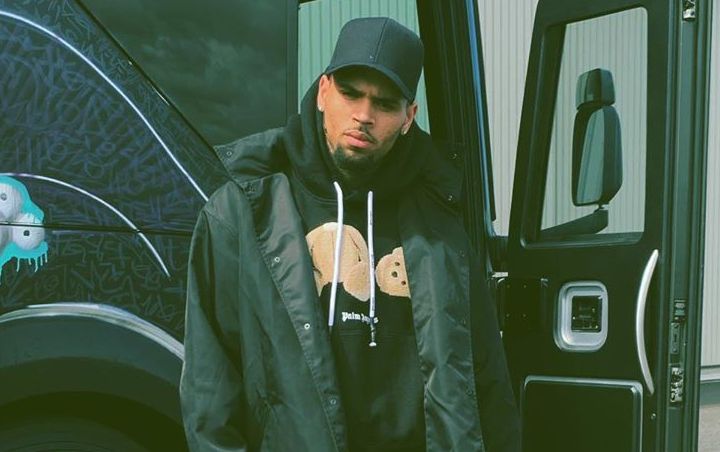 Watch: Chris Brown Gets Into Heated Argument With Fan Trying to Sneak Onto His Home