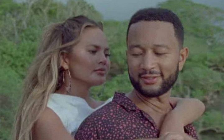 Chrissy Teigen Hints at Third Pregnancy in John Legend's 'Wild' Music Video