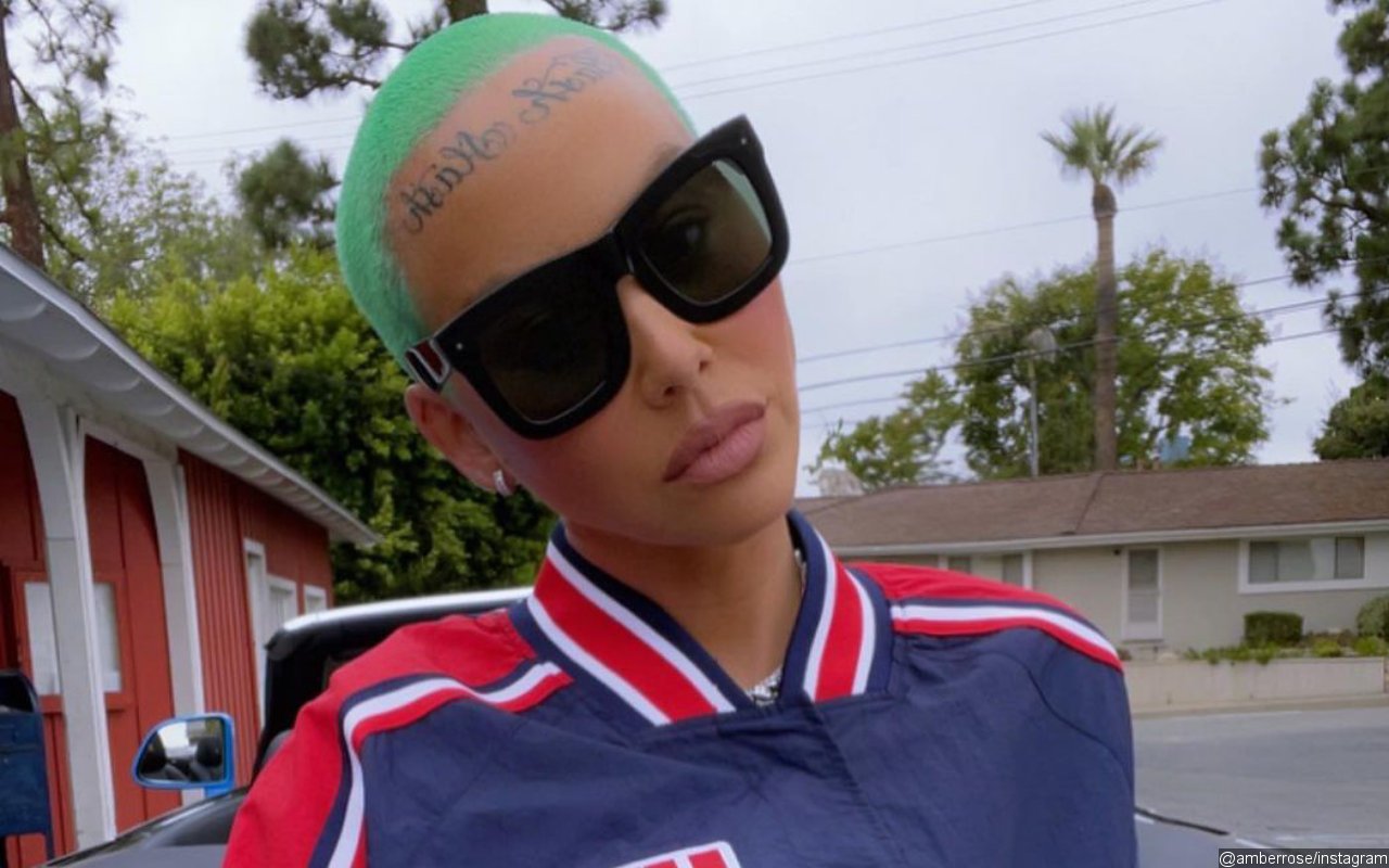 Amber Rose Trolled About Her Face Tattoo as She's Getting Liposuction