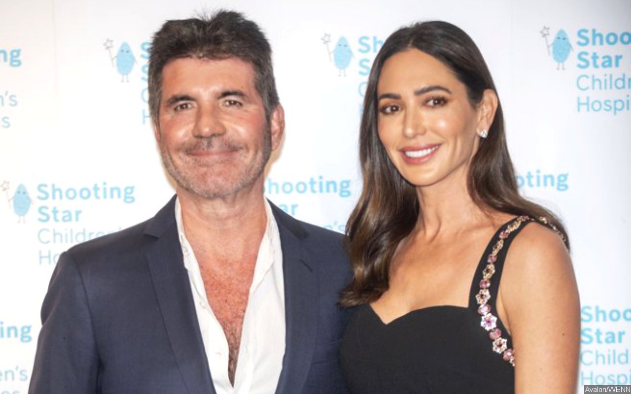 Simon Cowell and Lauren Silverman