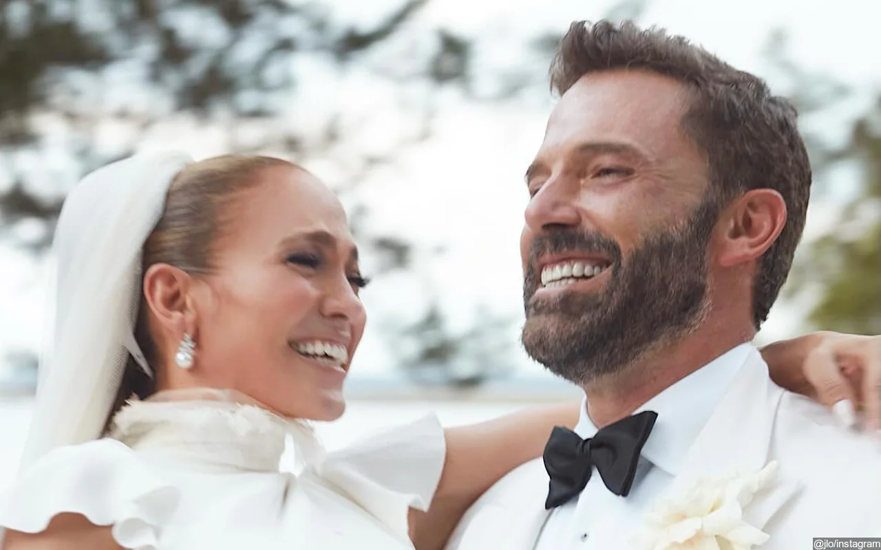 Jennifer Lopez Shuts Down Fan Theory About Her Movie Dress at Her Wedding to Ben Affleck