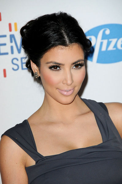 kim kardashian plastic surgery before and after. Kim Kardashian on Plastic