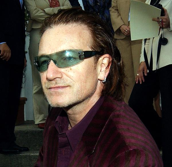 U2<br>Bono enters Lillies Bordello Nightclub