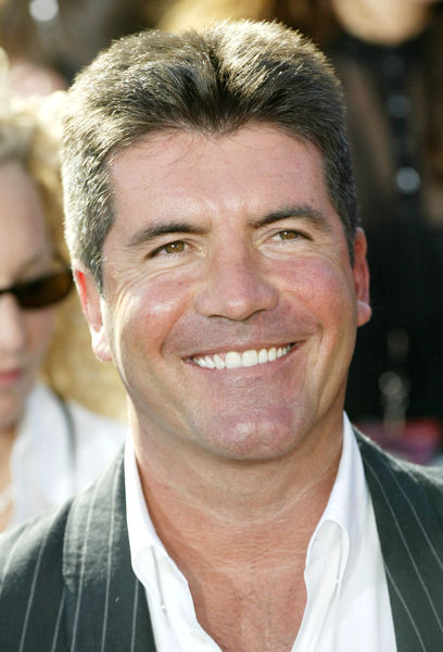 simon cowell wife 2010. Simon Cowell Confirms His Exit