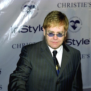 Elton John in Elizabeth Taylor's Jewelry Auction