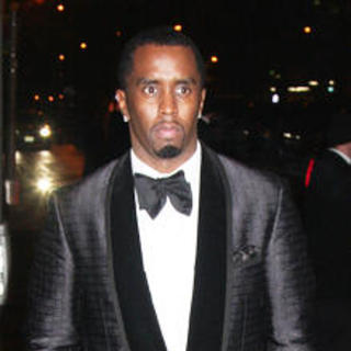 P. Diddy in Madonna and Gucci Host "A Night to Benefit Raising Malawi and UNICEF" - Departures