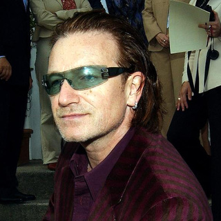 U2 in Bono enters Lillies Bordello Nightclub