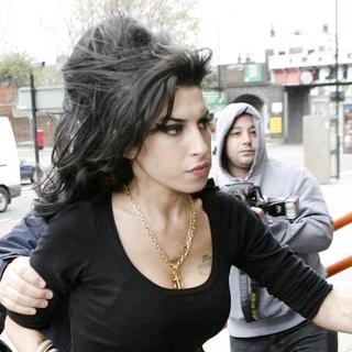 Amy Winehouse in Amy Winehouse and Pete Doherty at the Thames Magistrates Court in London on November 10, 2007