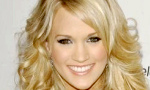 Carrie Underwood talks about Christmas duet with the legend.
