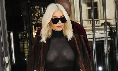 Kim Kardashian Appears Braless With Nude Bra and Sheer Top