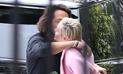 Miley Cyrus Spotted Getting a Kiss From Male Friend When Arriving at Video Shoot