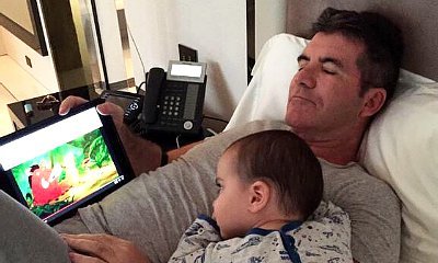 Simon Cowell Cuddles With Son Eric on Latest Tweet Pic
