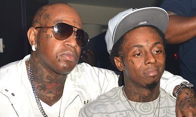 Report: Birdman Throws Drink at Lil Wayne During Weezy's Club Performance