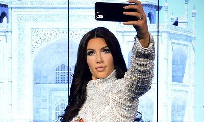 Kim Kardashian Immortalized With $230K Selfie-Taking Wax at Madame Tussauds