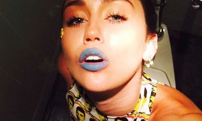 Miley Cyrus Takes Bizzare Toilet Selfie in Drake Outfit