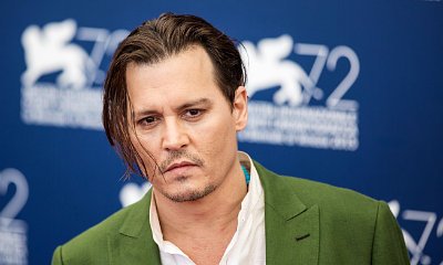 Johnny Depp Jokes About Dog Deportation Drama: 'I Killed My Dogs and Ate Them'
