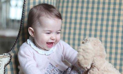 Aww! See Adorable Picture of Princess Charlotte Playing With Stuffed Dog