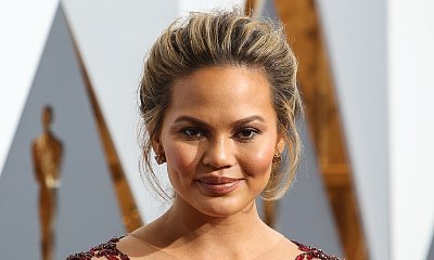 Chrissy Teigen: 'No One Told Me I Would Be Coming Home in Diapers Too'
