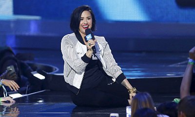 Demi Lovato Falls Onstage During Her WE Day Appearance and Handles It Like a Pro