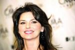 Shania Twain Signs to Be Journalist