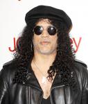 Slash Puzzled Over Axl Rose 's Decision to Sue Former Manager