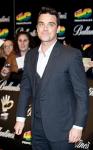 Robbie Williams to Perform for Injured Soldiers