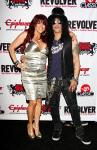Slash's Wife Accused of Assaulting Woman