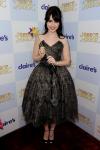 Lily Collins Channels Inner Snow White in Puffy Gown at 'Mirror Mirror' L.A. Premiere