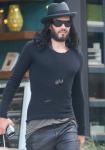 Russell Brand to Fight Felony Charge From Phone-Tossing Incident, Lawyer Says